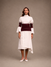 RŪH 03 Draped Waist Dress with a high-neck bodice, sheer wrapped waist, and asymmetric hem