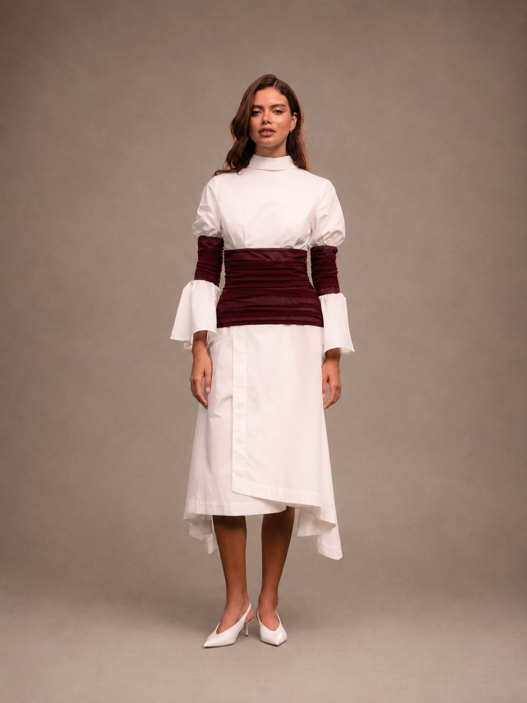 RŪH 03 Draped Waist Dress with a high-neck bodice, sheer wrapped waist, and asymmetric hem