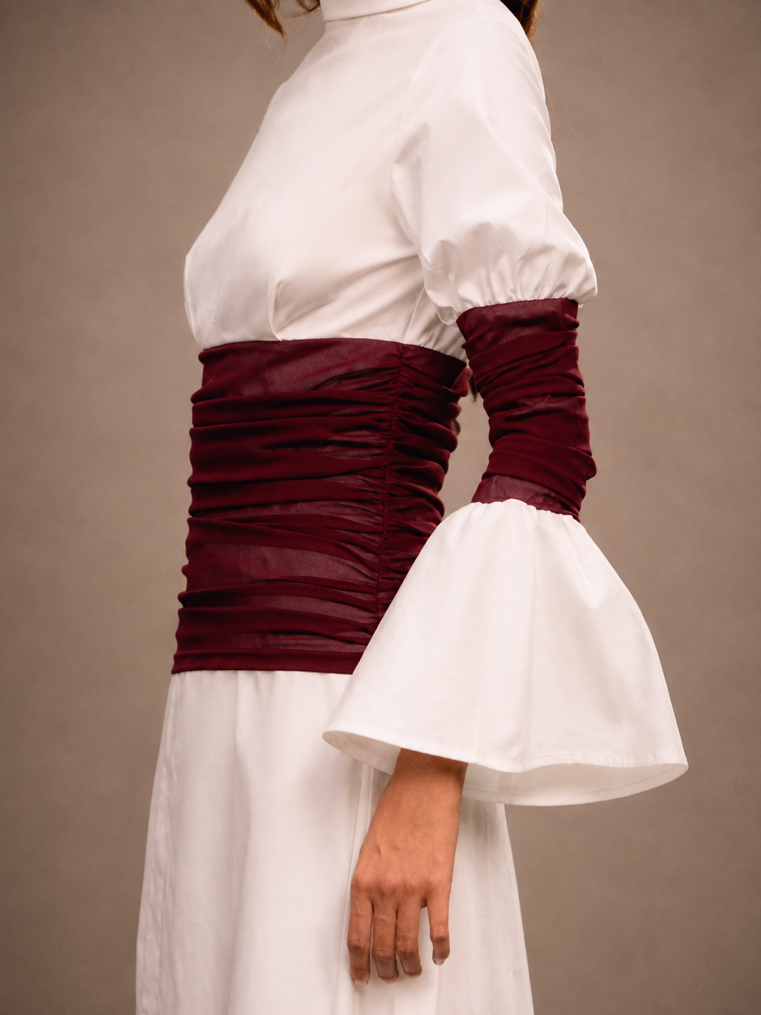 RŪH 03 Draped Waist Dress editorial view of the draped waist and soft volume