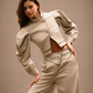 RŪH 02 Sculpted Jacket showing high neckline and refined sleeve shaping