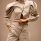 RŪH 02 Asymmetric Trousers with an overlapping waist, gold-tone buttons, and wide leg