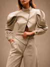 RŪH 02 Asymmetric Trousers with an overlapping waist, gold-tone buttons, and wide leg