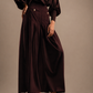 RŪH 05 Palazzo Trousers with high waist, soft front pleats, and wide floor-length leg