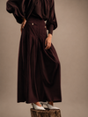 RŪH 05 Palazzo Trousers with high waist, soft front pleats, and wide floor-length leg