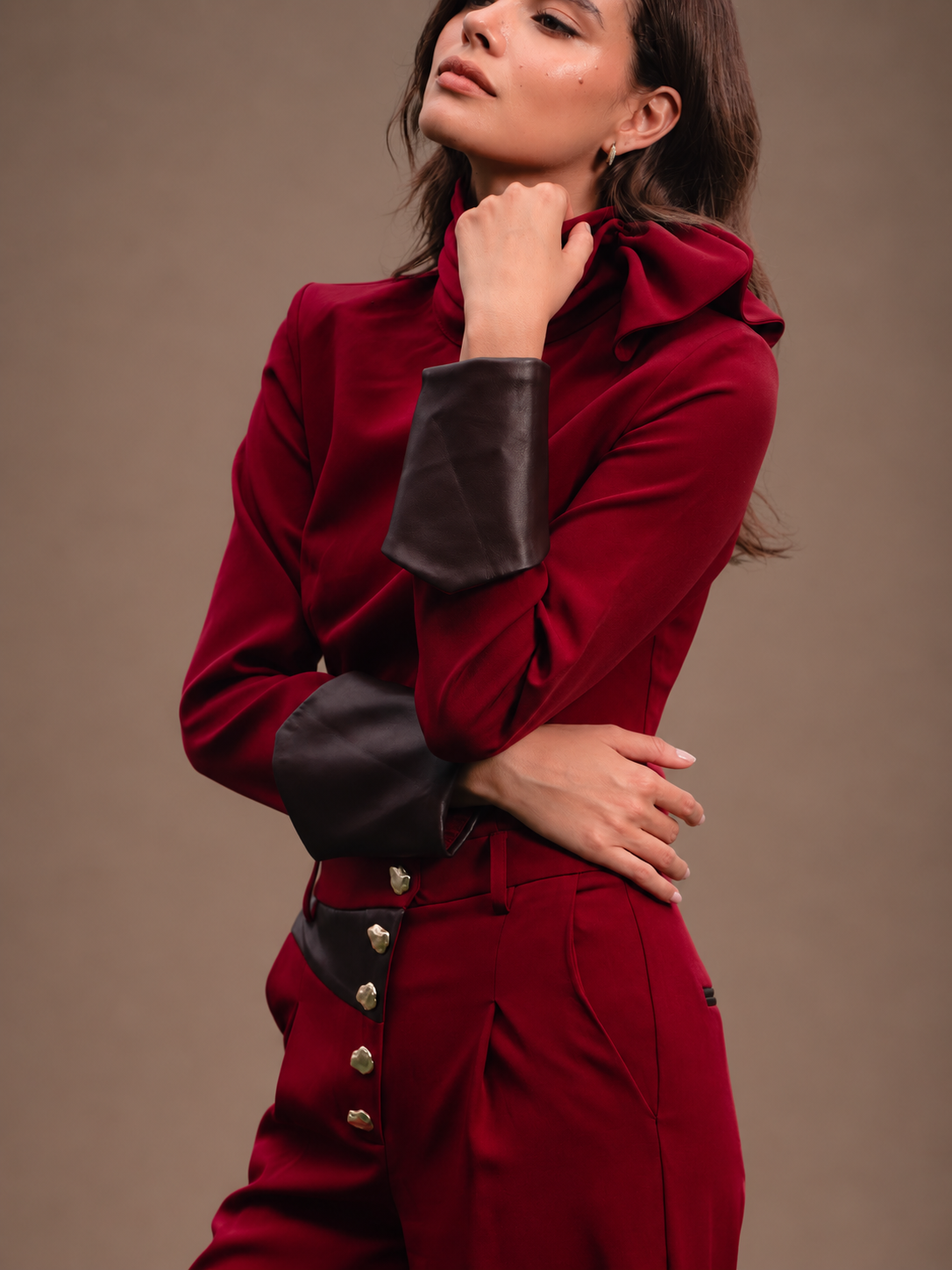 RŪH 04 Leather Top burgundy long-sleeve silhouette with a high neckline