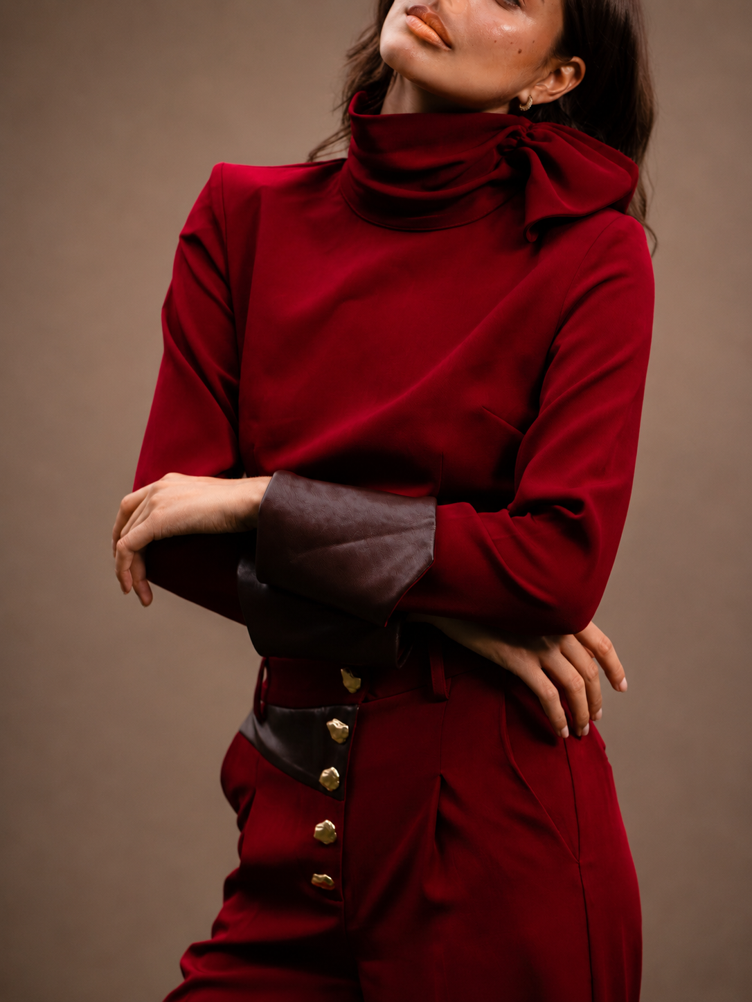 RŪH 04 Leather Top showing the asymmetric shoulder and gathered detailing