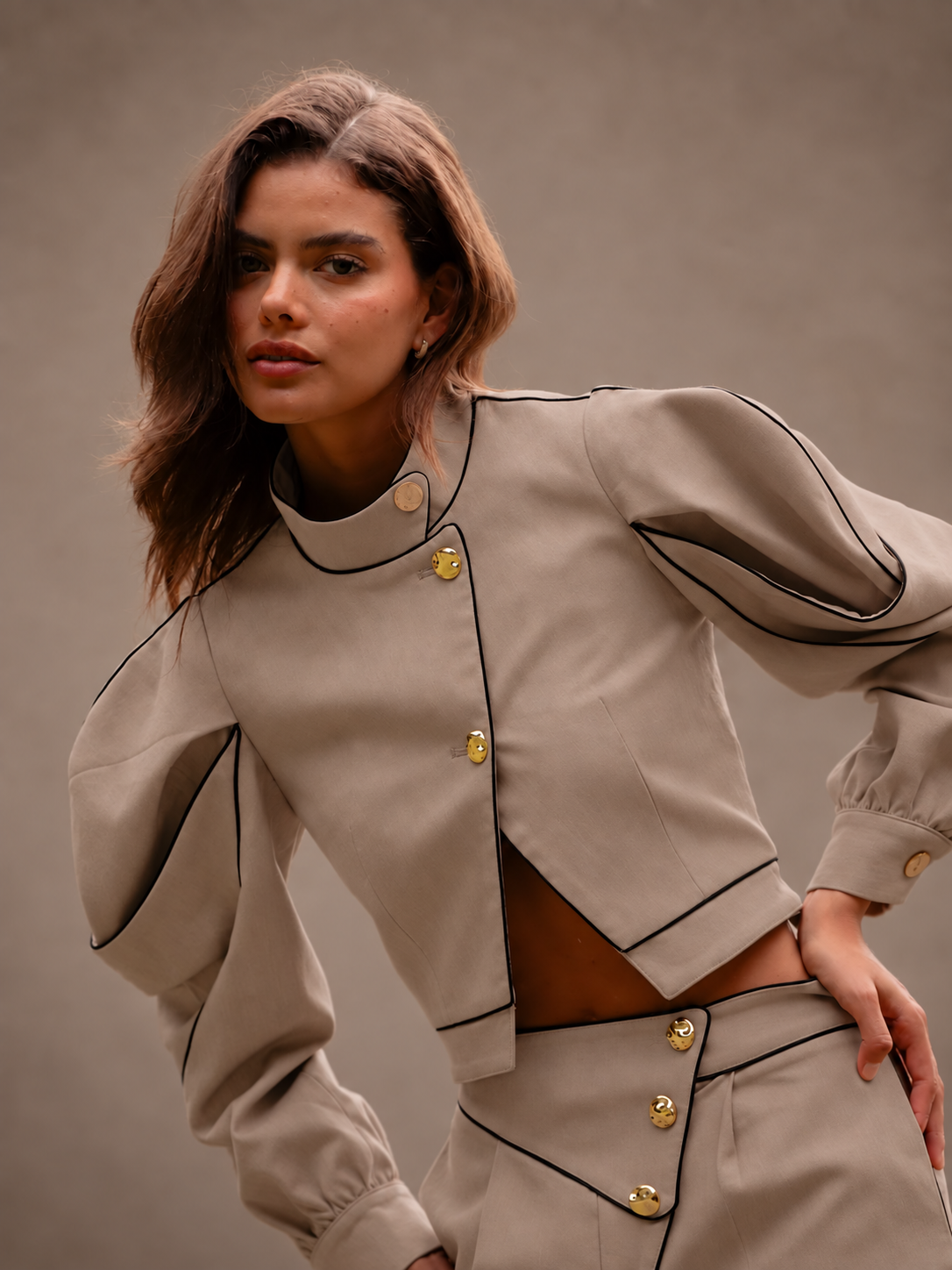 RŪH 02 Sculpted Jacket in a tailored editorial setting